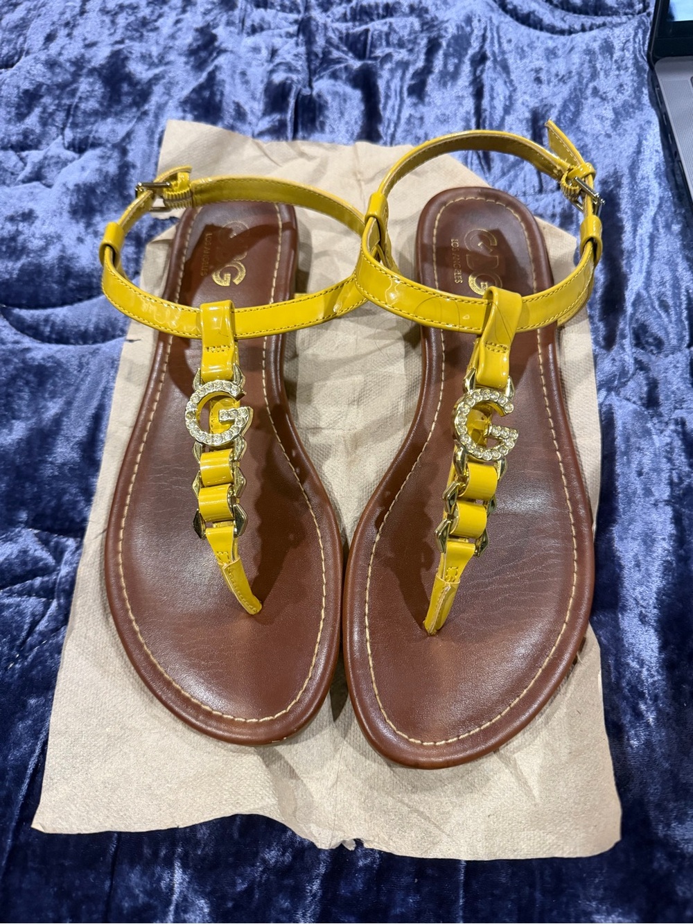 BCBG Yellow Patent T-Strap Sandals with Crystal 'G' Accent